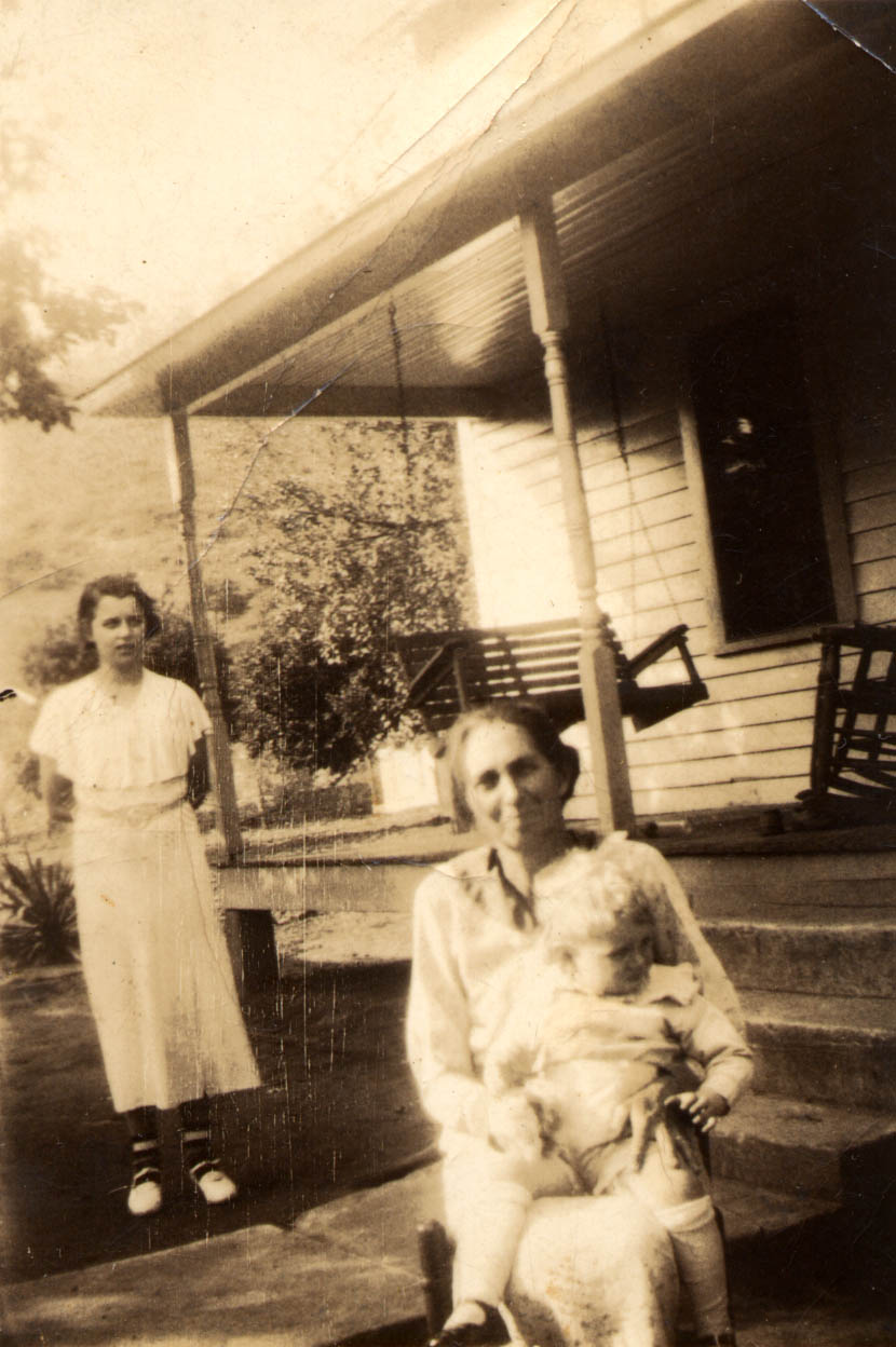 Aunt Delia (holding baby)