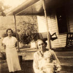 Aunt Delia (holding baby)
